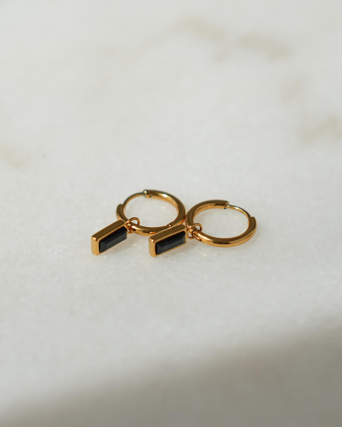 TINY HOOPS WITH GEM CHARM