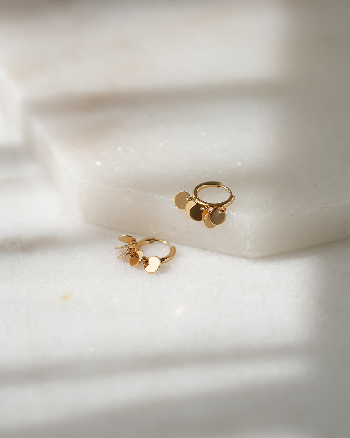 TINY HOOPS WITH GOLD BUTTONS