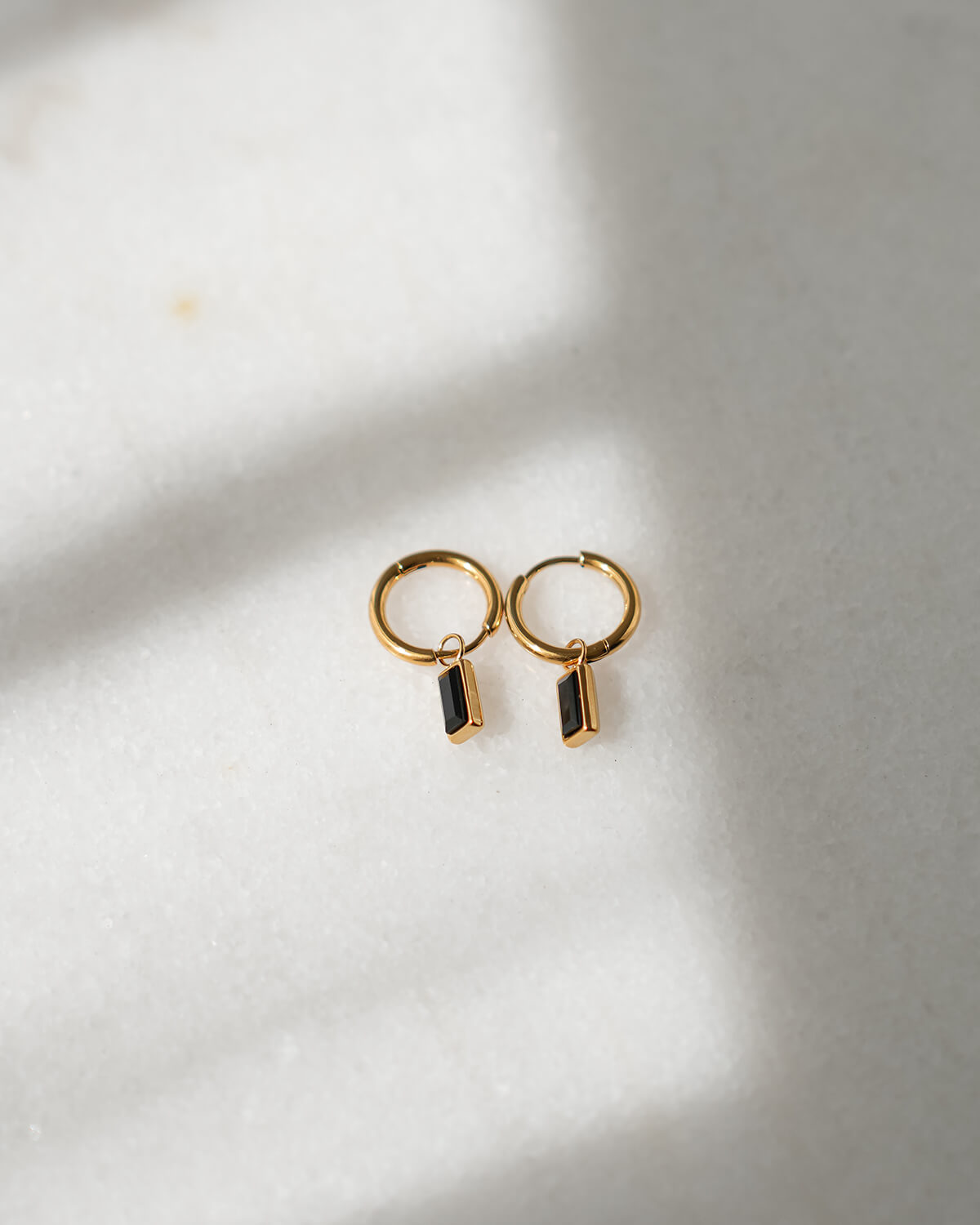 TINY HOOPS WITH GEM CHARM